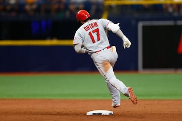 Jun 27, 2021; St. Petersburg, Florida, USA; Los Angeles Angels designated hitter Shohei Ohtani (17) rounds second after hitting a home run in the ninth inning against the Tampa Bay Rays at Tropicana Field. Mandatory Credit: Nathan Ray Seebeck-USA TODAY Sp